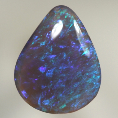 SOLID BLACK CRYSTAL OPAL Bright green sparkles in a 3D pattern
